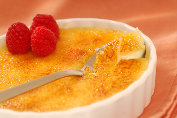 Image showing Creme Brulee with raspberries