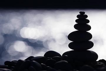 Image showing Backlit Stone Stack on the Beach