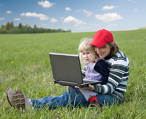 Image showing mother and daughter with laptop