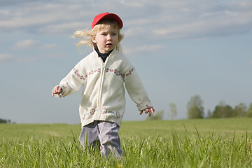 Image showing little girl on green meadow