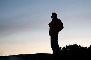 Image showing tourist woman silhouette