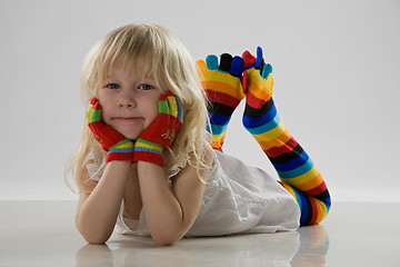 Image showing little girl lie on floor