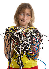 Image showing crazy woman with tangle of cables