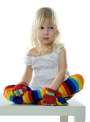 Image showing little girl sits on white chair