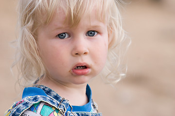 Image showing blonde sad little girl