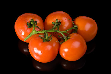 Image showing five red tomatoes
