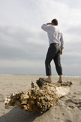 Image showing Shipwrecked businessman