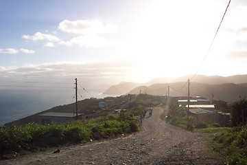 Image showing sunset on coastal road
