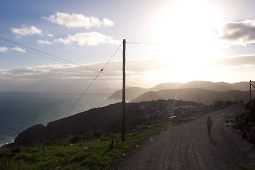 Image showing sunset on coastal road