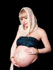 Image showing Pregnant woman holding belly