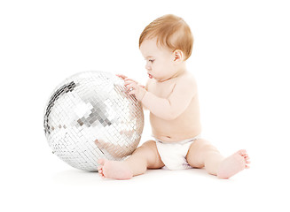 Image showing adorable baby boy with big disco ball