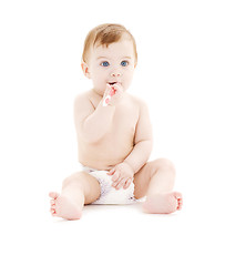 Image showing baby boy in diaper with toothbrush