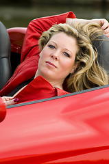 Image showing woman red sports car