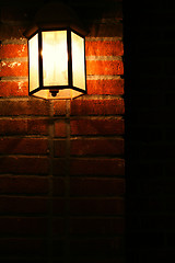 Image showing Light on a brick wall