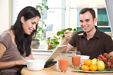 Image showing Couple eating breakfast