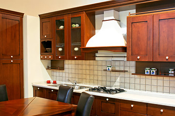 Image showing Dark wood kitchen