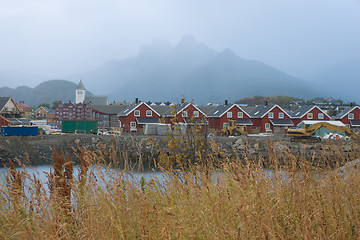 Image showing Red houses near lake