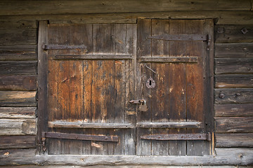 Image showing Wooden shutters with  lock