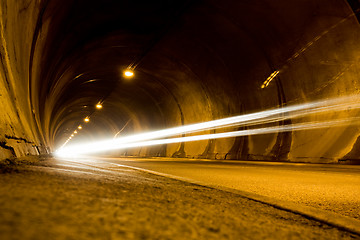 Image showing lone car moving fast in tunnel