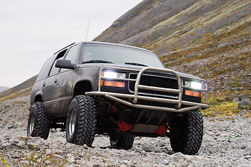 Image showing car off-road on mountain background