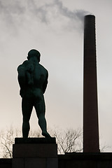 Image showing Statue of  nude man from back