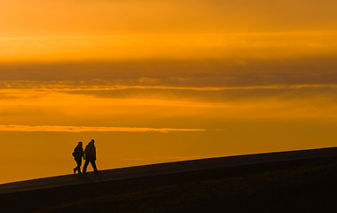 Image showing silhouettes of walking people