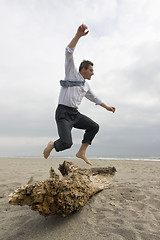 Image showing Businessman overcoming an obstacle