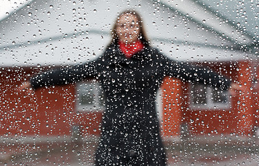 Image showing Beautiful girl with red scarf and umbrella