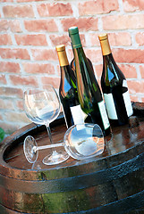 Image showing Wine on wood barrel