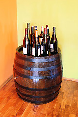 Image showing Wine over wood barrel