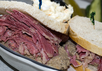Image showing corn beef with chopped liver sandwich on rye bread