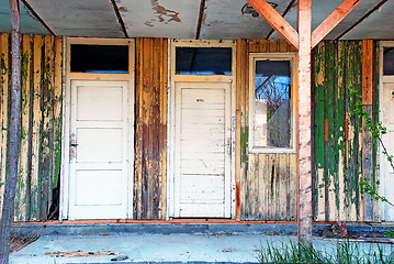 Image showing old wooden doors abandoned house