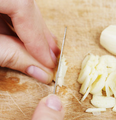 Image showing Chopping the Garlic