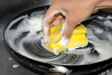 Image showing Washing dishes