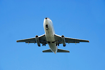 Image showing Plane over blue sky