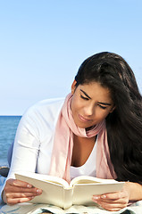 Image showing Young native american woman reading