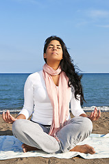 Image showing Young native american woman meditating