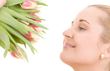 Image showing happy woman with flowers