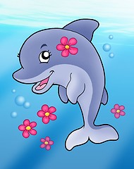 Image showing Cute dolphin girl in sea