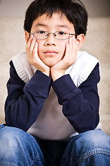 Image showing Sad asian boy