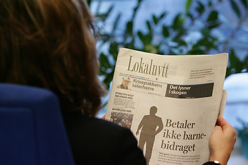 Image showing Reading newspaper
