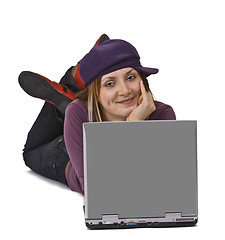 Image showing Young woman with a laptop