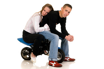 Image showing Youngsters with their pocket-bike