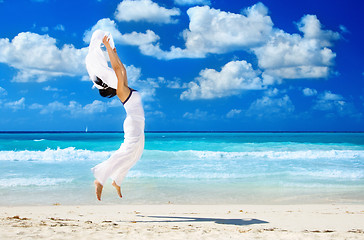 Image showing happy woman with white sarong