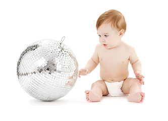 Image showing adorable baby boy with big disco ball