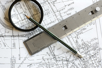 Image showing blueprint with pencil, loupe and steel scale ruler