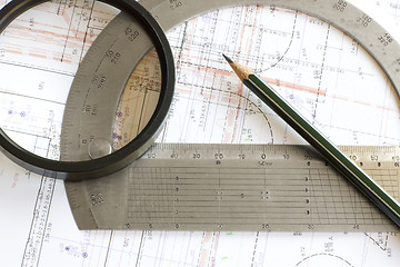 Image showing blueprint with pencil, loupe and steel protractor