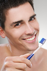 Image showing Brushing teeth