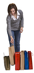 Image showing Young woman with shopping bags