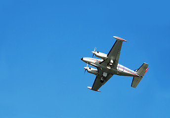 Image showing Plane over blue sky